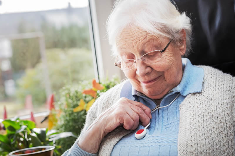 Téléphone alarme en pendentif avec bouton personne âgée